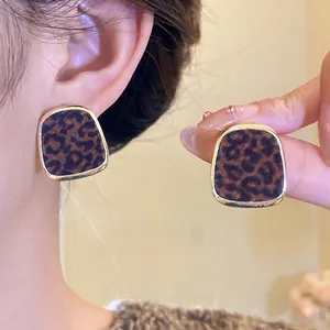 Boucles d'oreilles vintage imprimé léopard avec bordure dorée pour femmes élégantes