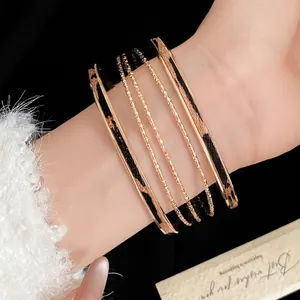 Elegant gold bangle bracelet set with leopard leather print fashion jewelry for women