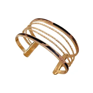 Elegant leopard print multi-layer gold cuff bracelet with textured strands and open design