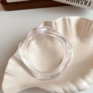 Minimalist transparent acrylic irregular bangle with a premium smooth polished finish