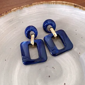 Elegant blue marbled acrylic geometric square earrings with gold accents for women