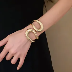 Statement minimalist gold chunky irregular open cuff bracelet with a geometric hollow design