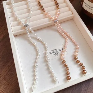 French style long pearl tassel necklace with rhinestone heart clasp