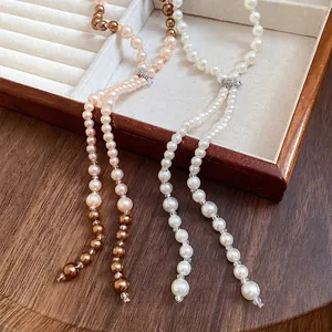French luxury long tassel pearl necklace with sparkling diamond slider bead