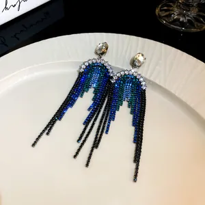 Glamorous oversized blue and green tassel earrings with sparkling rhinestones for party wear