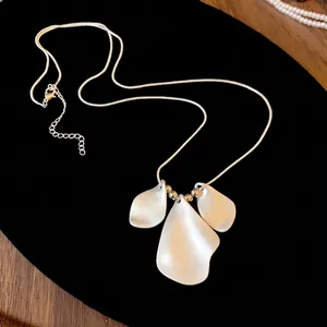 Elegant minimalist irregular matte white petal necklace with adjustable silver chain