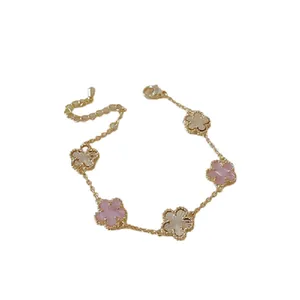 Elegant 18K gold plated flower bracelet with pink mother of pearl and beaded edge