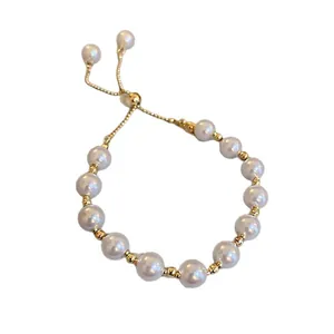 Bracelet élégant en perles d'eau douce roses avec chaîne coulissante ajustable