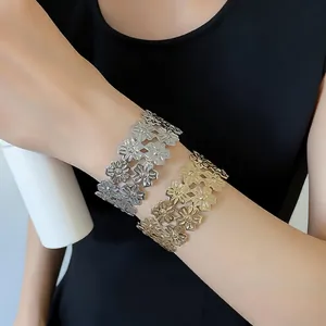 Elegant metal star pattern cutout cuff bracelet in gold and silver finishes for women