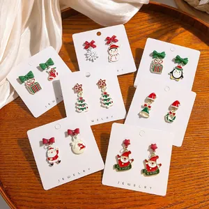 Συλλογή από χριστουγεννιάτικα σκουλαρίκια με τον Άγιο Βασίλη και χιονάνθρωπους