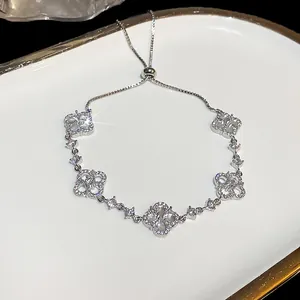 Sparkling silver zircon flower bracelet with adjustable drawstring closure detail