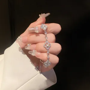 Detail of zircon flower bracelet with adjustable pull-string design and shiny stones