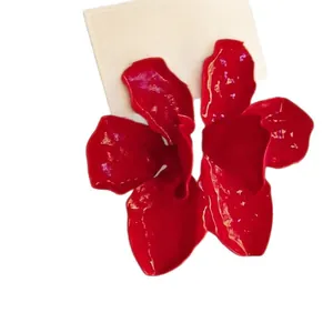 Statement oversized red flower stud earrings with a glossy spray-painted fashion finish