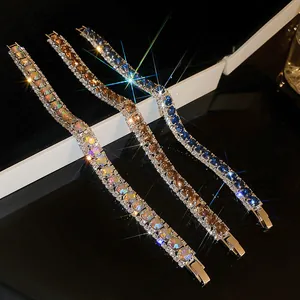 Sparkling square crystal link bracelets with fold-over clasps in blue, gold, and multi