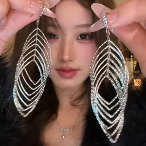 Luxus Metall Zirkonia Hohl Ohrringe Für Damen Elegant Geometrisch Ohrhaken Lange Quaste Designer Nische Mode Schmuck Zubehör