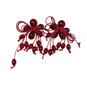 Eleganti orecchini a lobo in resina rossa con fiocco e nappe gioielli festivi