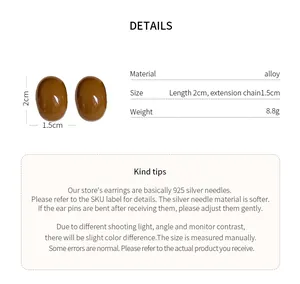 Spécifications détaillées des boucles d'oreilles ovales marron vintage avec taille.