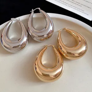 Boucles d'oreilles créoles épaisses en métal en forme de goutte d'eau dorée et argentée