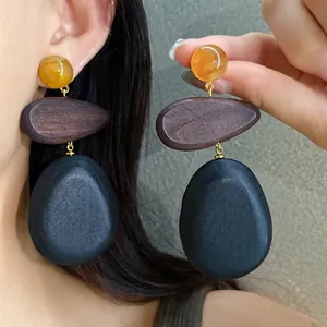 Bohemian ethnic style wooden water drop earrings with amber resin studs and silver needles