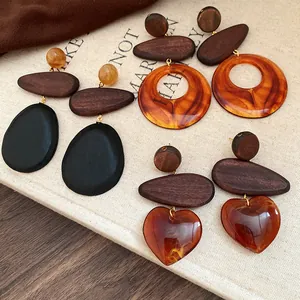 Vintage style wood and resin drop earrings collection with various geometric shapes