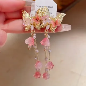 Elegant pink crystal butterfly tassel earrings with silver needles