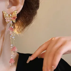 Elegant golden butterfly earrings with pink crystal flower tassels and white pearls