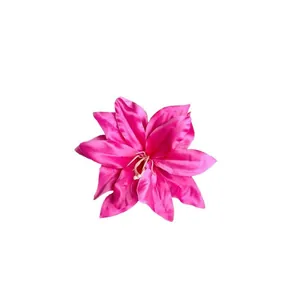 Elegant pink silk lily flower hair clip for aesthetic styling and creative photo shoots