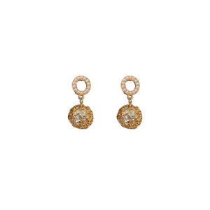 Vintage golden geometric earrings featuring pearls and silver needles for women