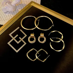 Stylish gold-toned geometric metal hoop earrings set for women, elegant fashion jewelry
