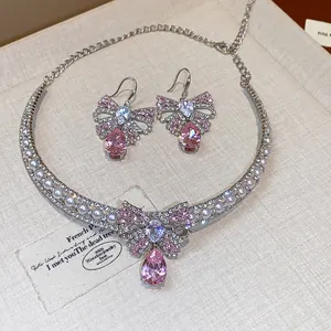 Elegant Korean style butterfly necklace and earrings set with pink zircon crystals