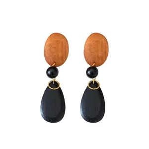 Vintage wooden bead earrings with oval and teardrop shapes in brown and black