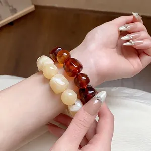 Chic acrylic irregular geometric beaded bracelets in amber and cream tones for women