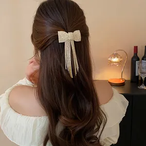 Elegant rhinestone bow hair clip with long sparkling tassels for women hair styling