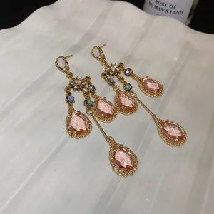French vintage luxury tassel earrings with pink water-drop crystals and star motifs