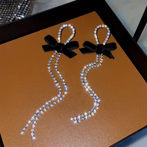 Elegant long tassel earrings with black velvet bow and sparkling crystal rhinestones
