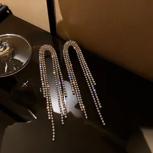 Close-up of elegant rhinestone tassel earrings with a brilliant sparkle finish