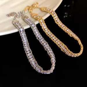 Detailed view of elegant gold and silver multi-row rhinestone chain bracelets for women