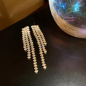 Exquisite sparkling long tassel drop earrings featuring shimmering crystals for women