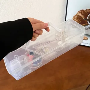 Portable transparent plastic jewelry box with white handle for dustproof organization