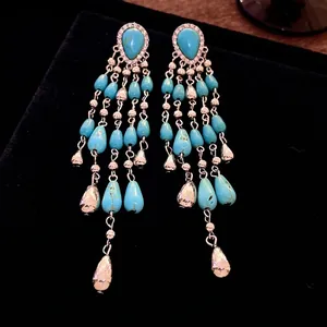 Bohemian style turquoise teardrop tassel dangle earrings with sparkling rhinestones