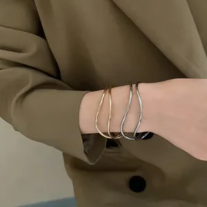 Bracciali rigidi aperti multistrato ondulati minimalisti da donna in oro e argento