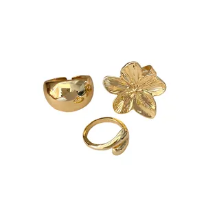 Elegant minimalist gold-plated ring set with polished flower and dome designs for women