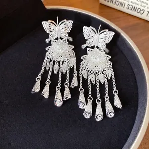 Boucles d'oreilles pendantes papillon et fleur en argent de style nouveau chinois