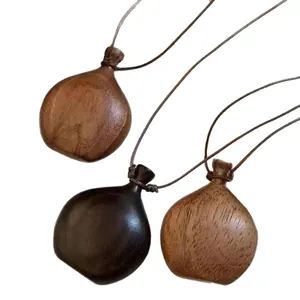 Three vintage-style resin water bottle pendants on wax cord necklaces