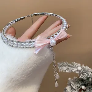 Elegant zircon pearl choker with pink silk bow and dangling crystal beads detail