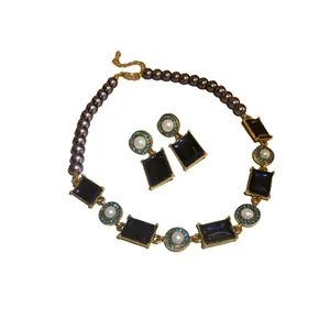 Vintage gold-plated necklace and earrings set with navy blue gems and pearls