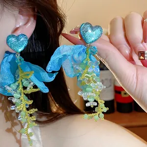 Exquisite blue heart stud earrings featuring chiffon flower petals and delicate green beaded vines