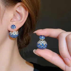 Elegant silver needle earrings with blue and white rhinestones, two-way wear design.
