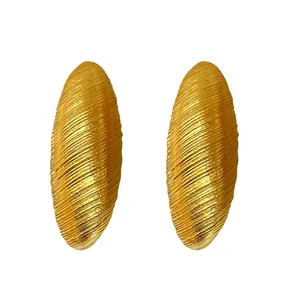 Elegant vintage gold oval stud earrings with unique textured ribbed finish for women