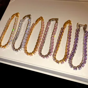 Detailed view of colorful square-cut cubic zirconia tennis bracelets with 18k gold plating